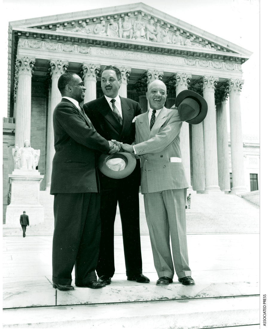 NAACP lawyers George E. C. Hayes, Thurgood Marshall, and James M. Nabrit celebrate the Brown decision outside the Supreme Court on May 17, 1954.