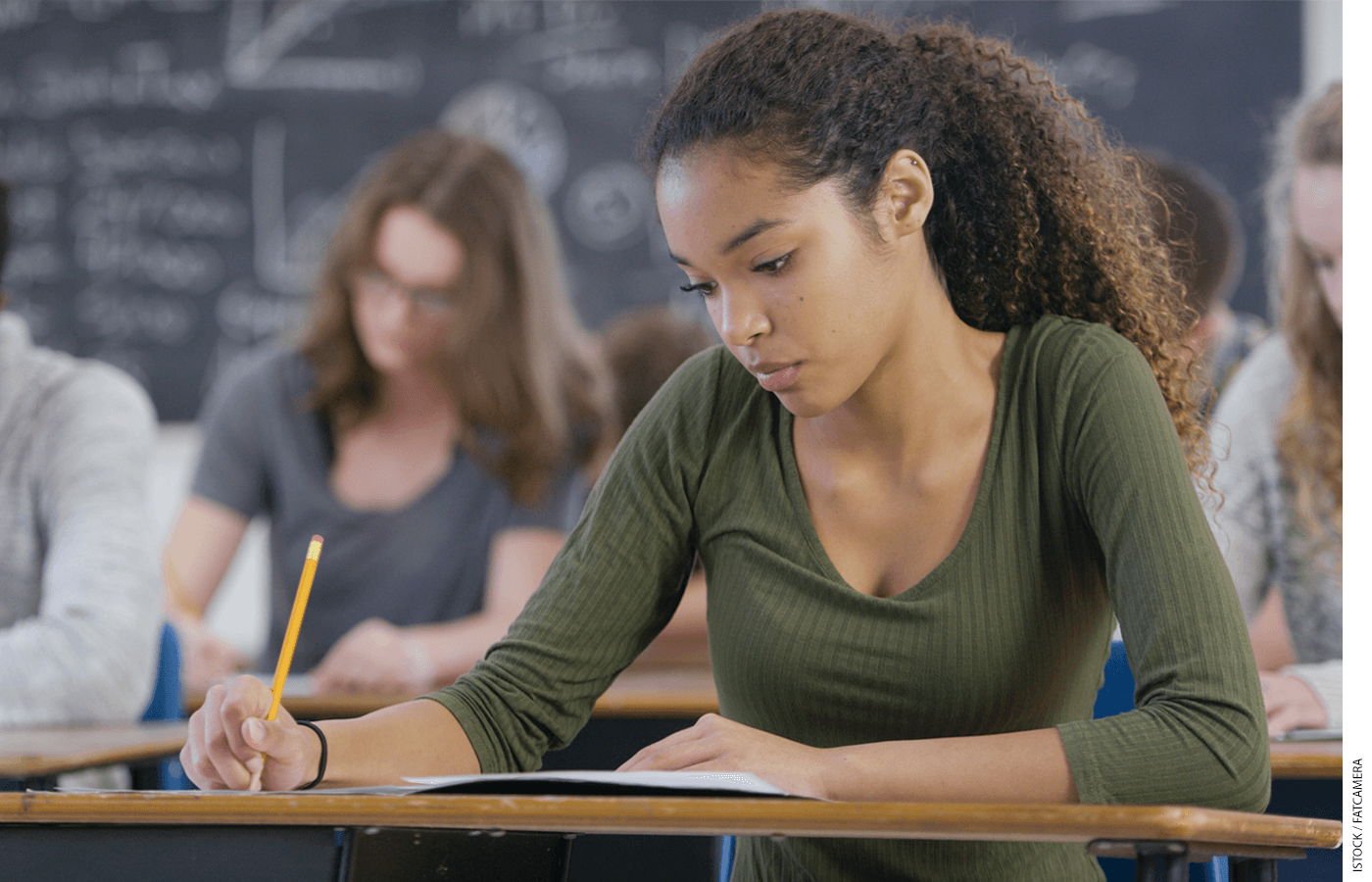 Female high school student taking a test