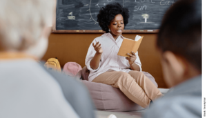 A teacher reads aloud in an elementary school class