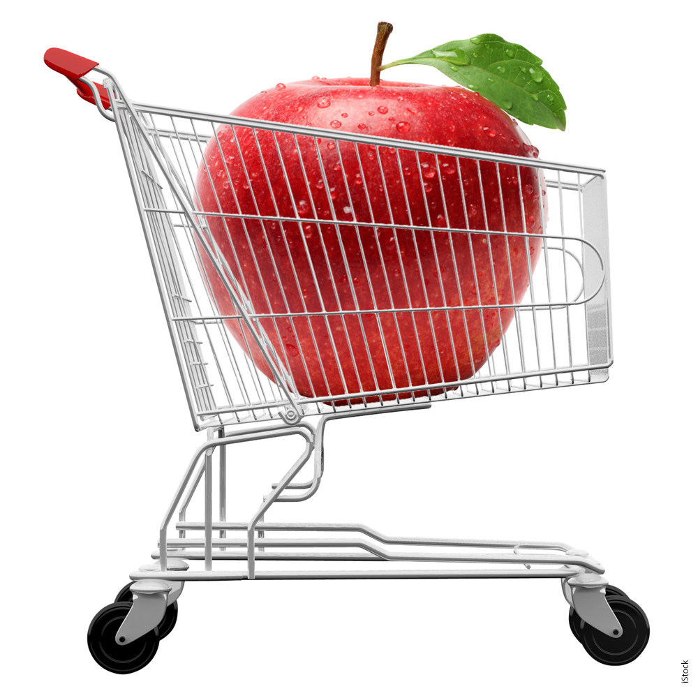 A giant apple inside a shopping cart