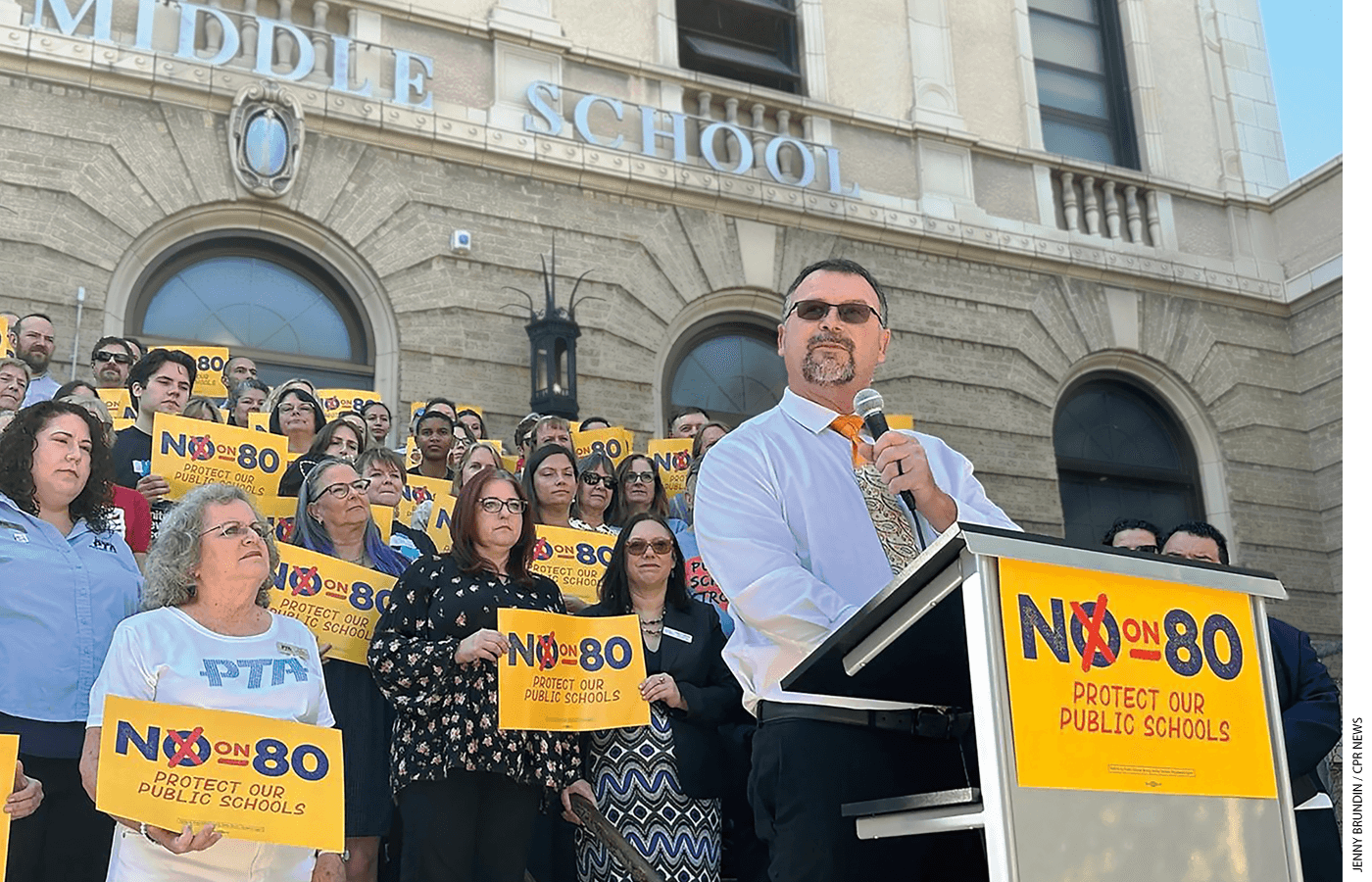 Superintendent Rob Sanders of Fort Morgan School District in Colorado rallies opponents of Amendment 80